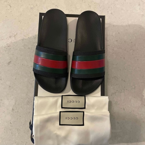 Gucci Other - Authentic Men’s Gucci Rubber slides, size 5. Like new with box and dust bags.